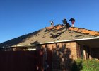 Shingle removal by Yates Roofing and Construction in Oklahoma City
